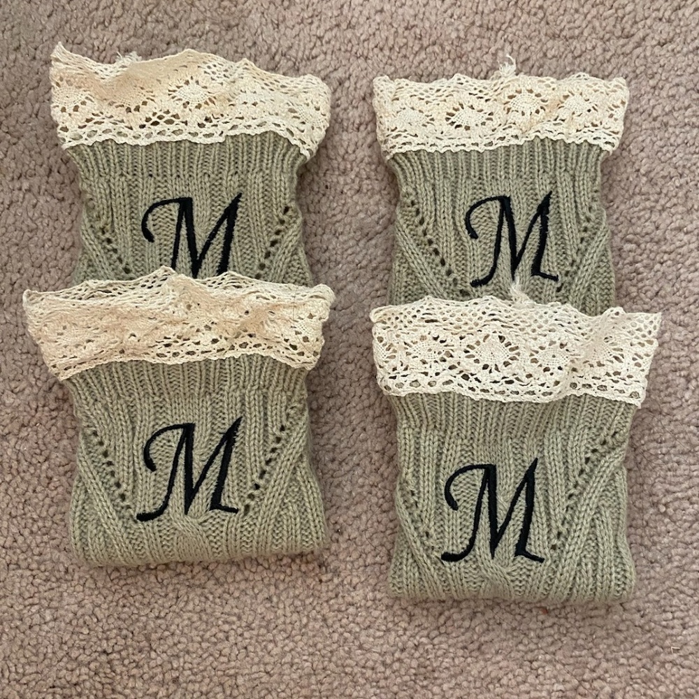 "M" Ankle Warmers in rustic grey color, navy letter, and rustic cream fringe